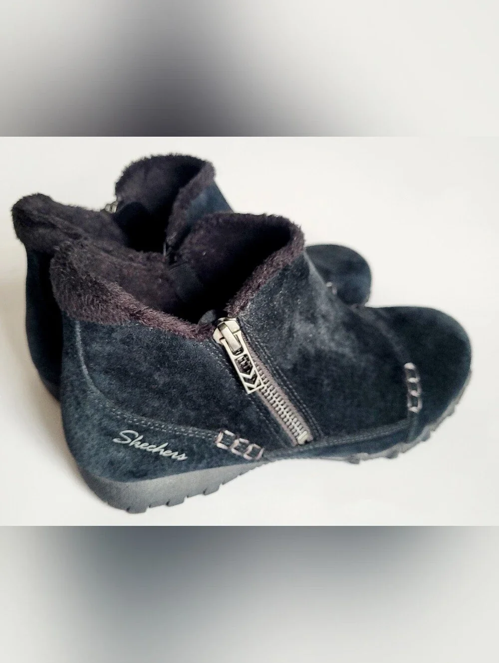 Skechers black suede